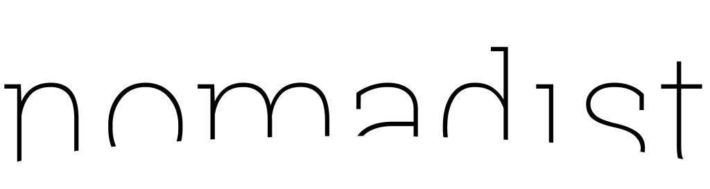 nomadist logotype: the word nomadist in black type with negative space creating a curve across the bottom of the word as if a horizon
